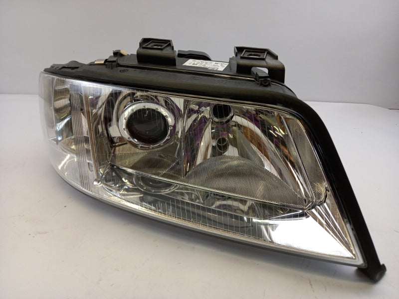 VAG Headlight 4B0941030M